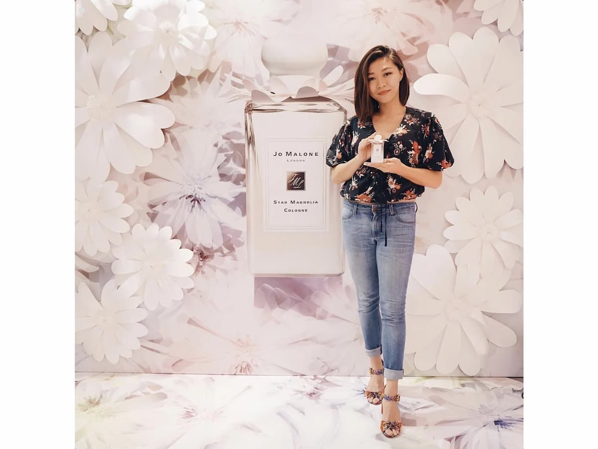 guest poses with product in launch event