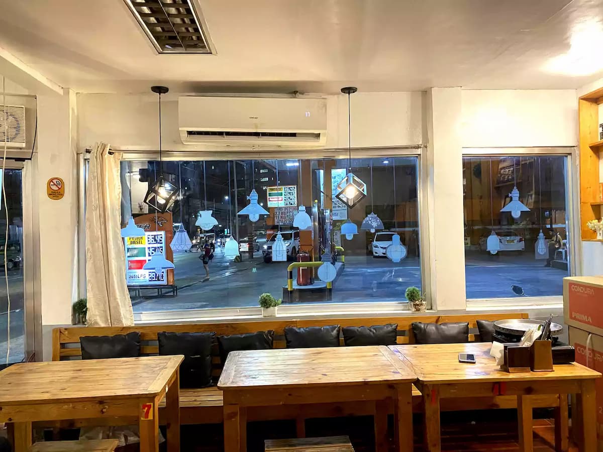 dining area with large window restaurant valenzuela