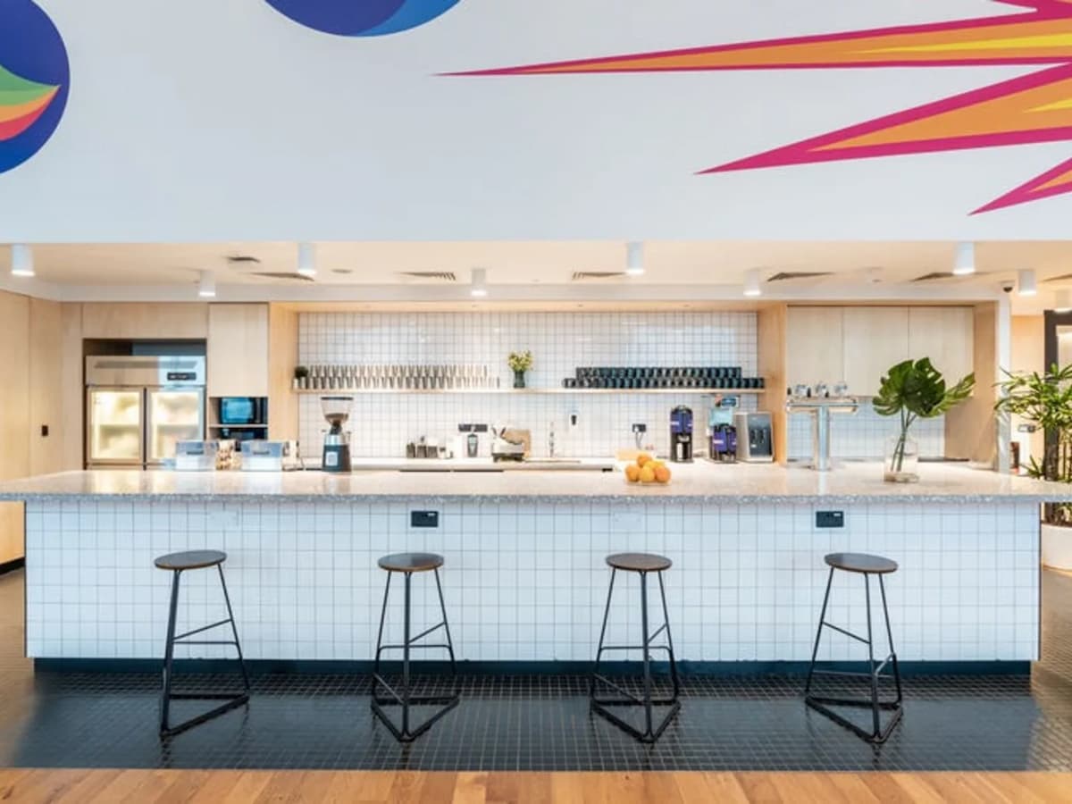 corporate event venues singapore with white minimalist pantry