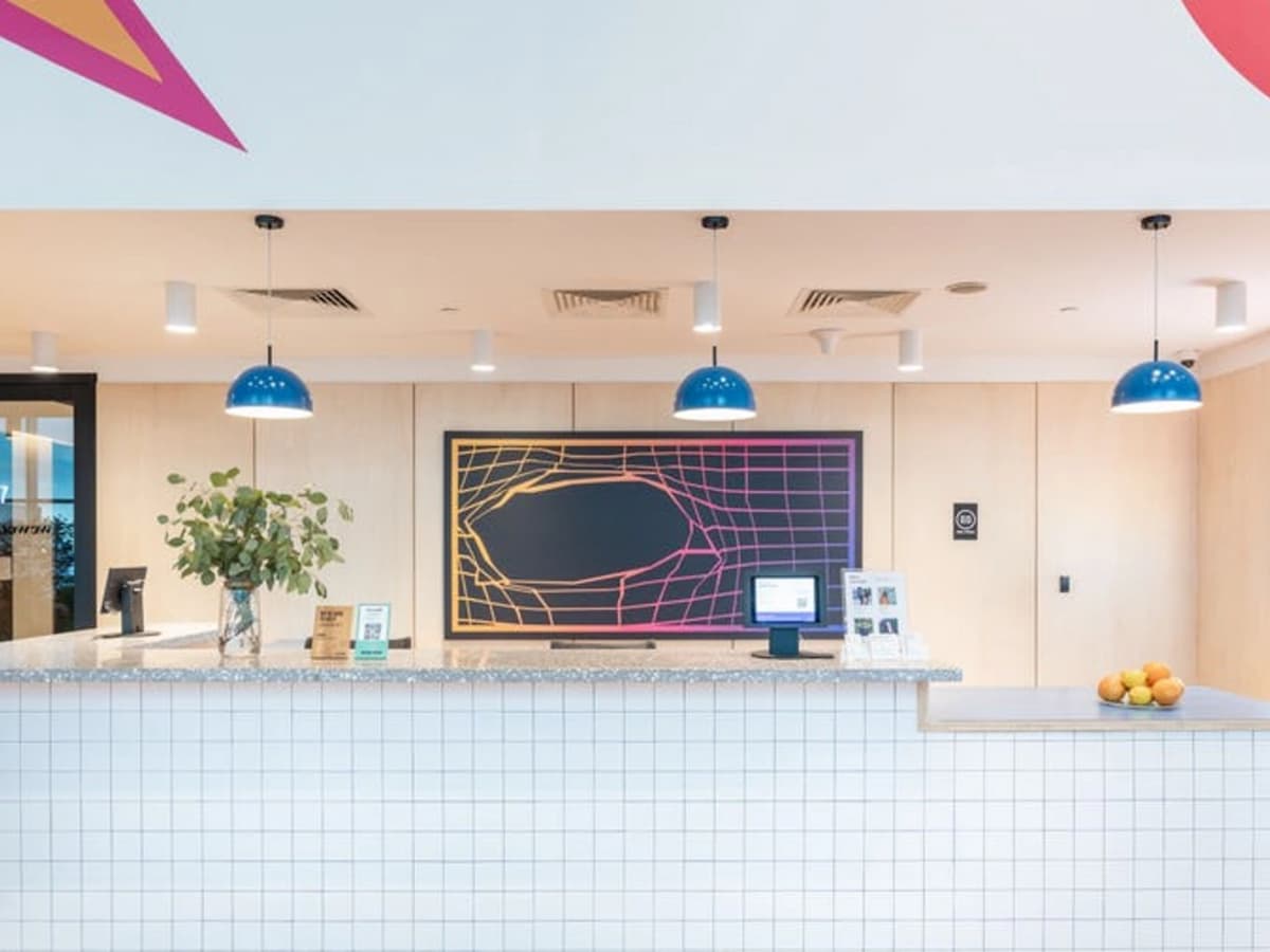 Grid painting behind a receiving area of corporate event space rental singapore