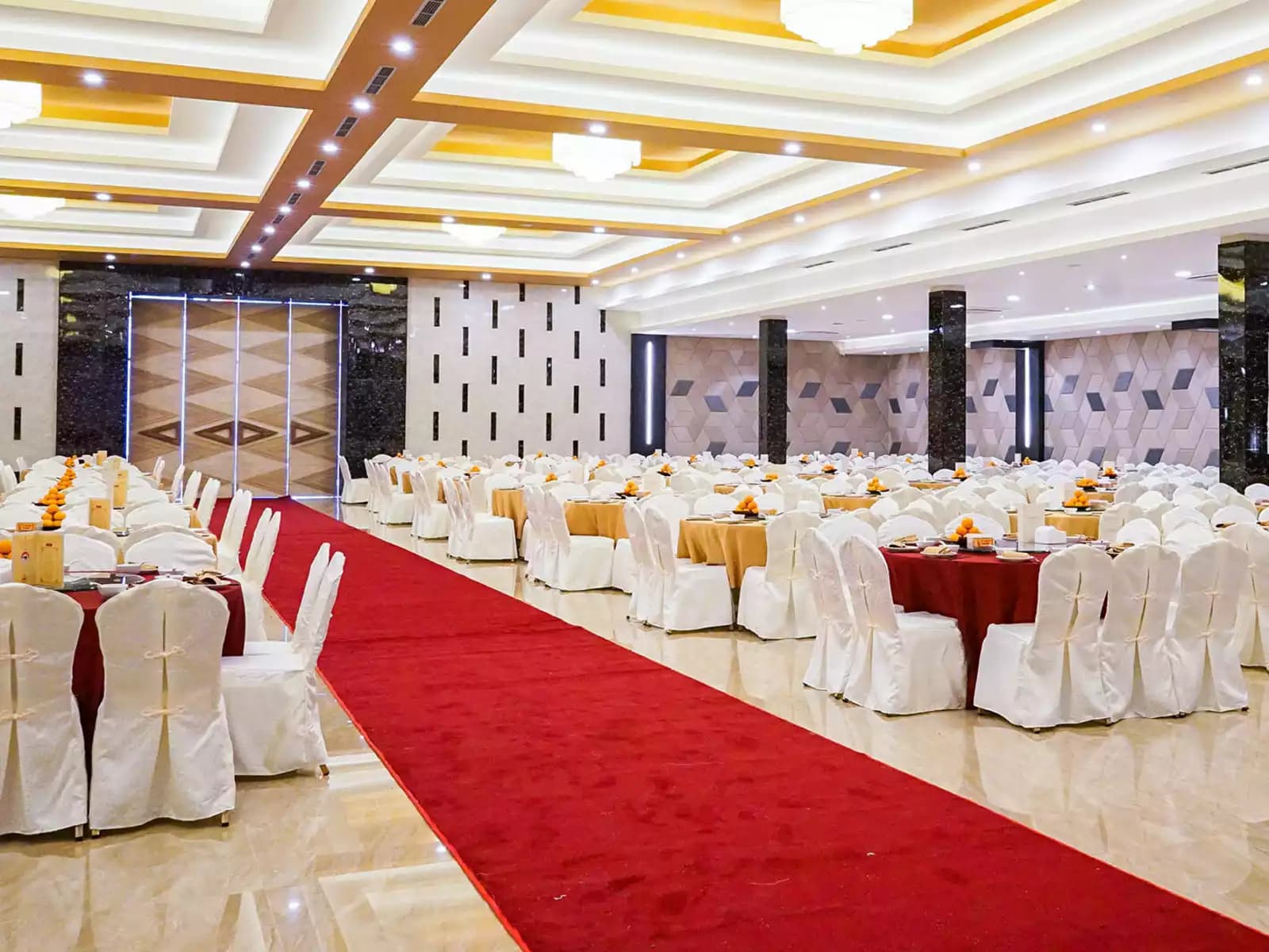 Red carpet down the aisle of venue