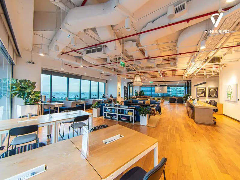 spacious office space with desks and couches for meeting venues for rent singapore