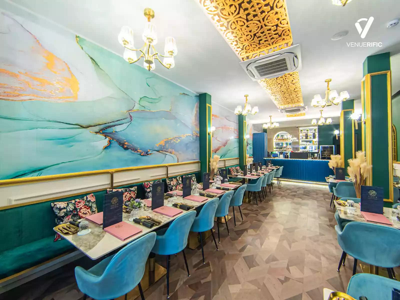 a restaurant with tables and chairs