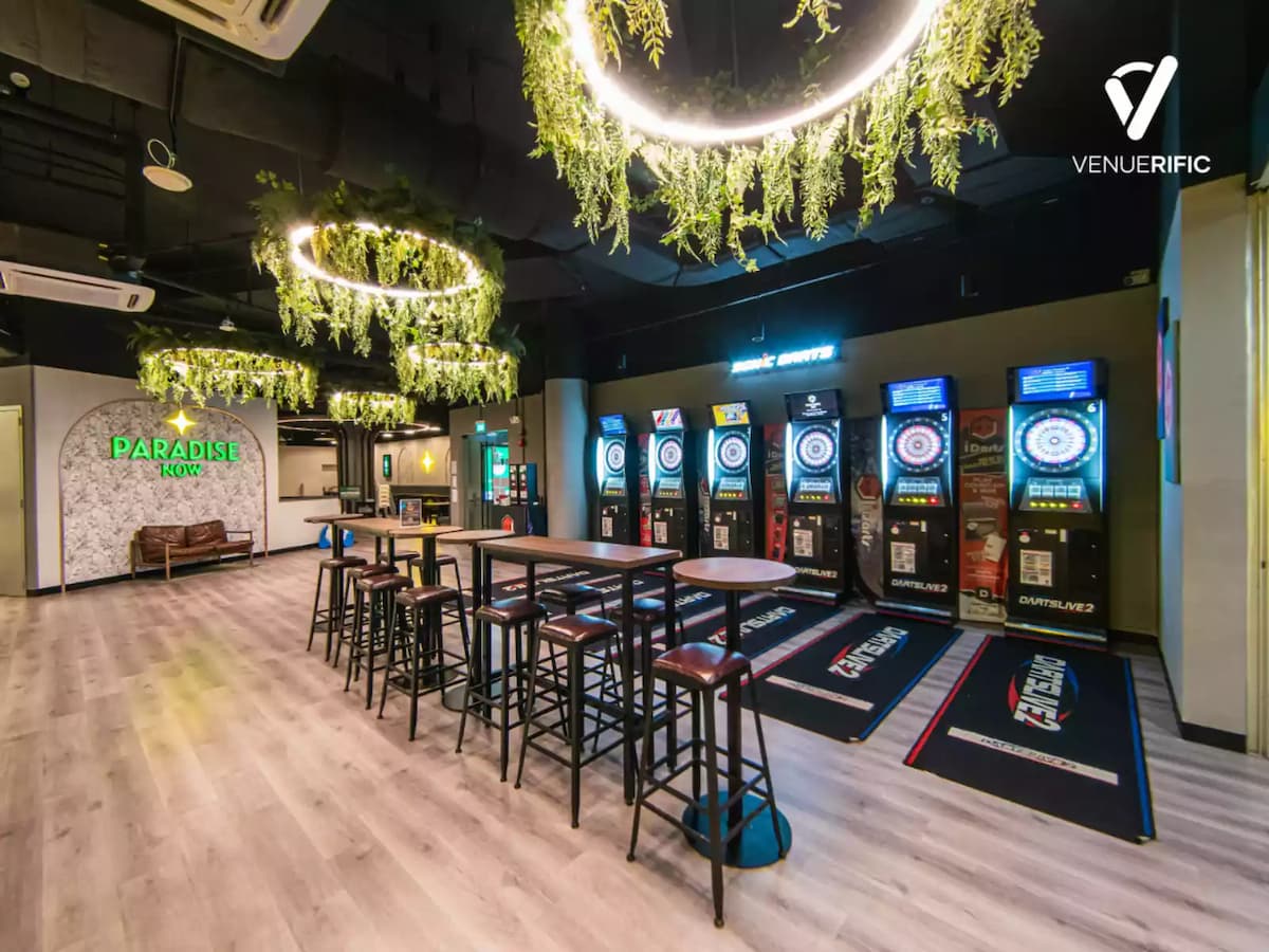 dart game room with tables and chairs