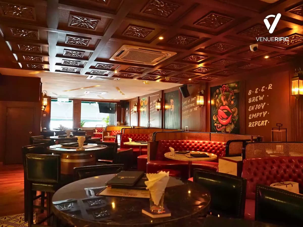 large restaurant with wooden ceiling with carvings