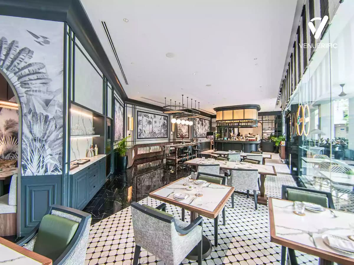 a private room full of table and chairs for meetings