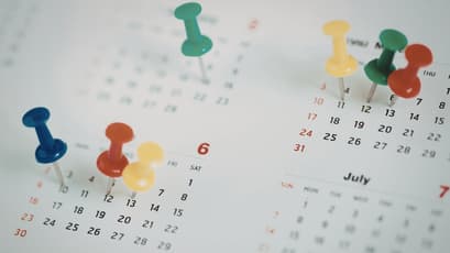event calendar with colorful pins