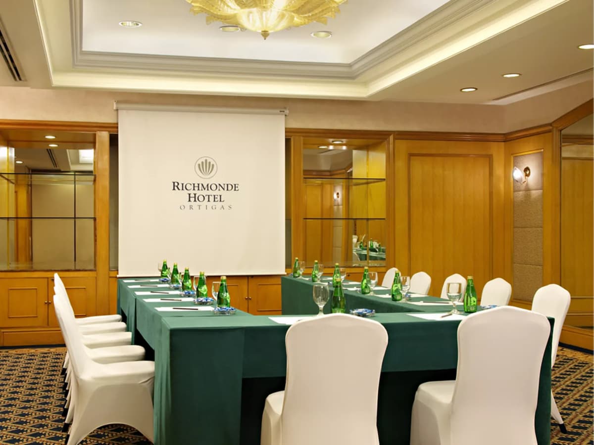 formal board meeting room with projector screen