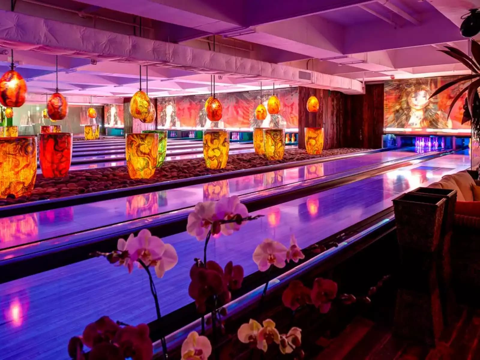 bar party venue with lot of hanging lamp on the ceiling