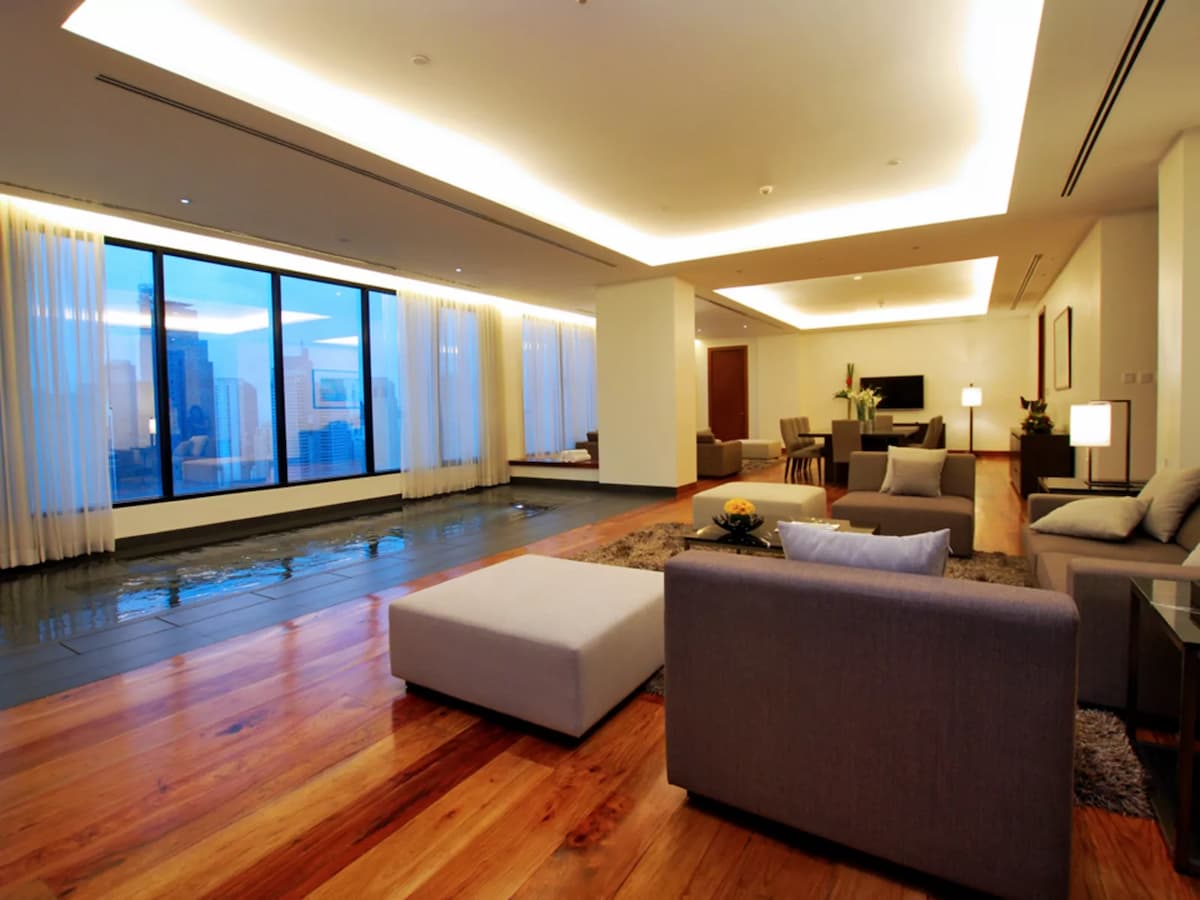 executive suite of the hotel featuring the living room and dining room