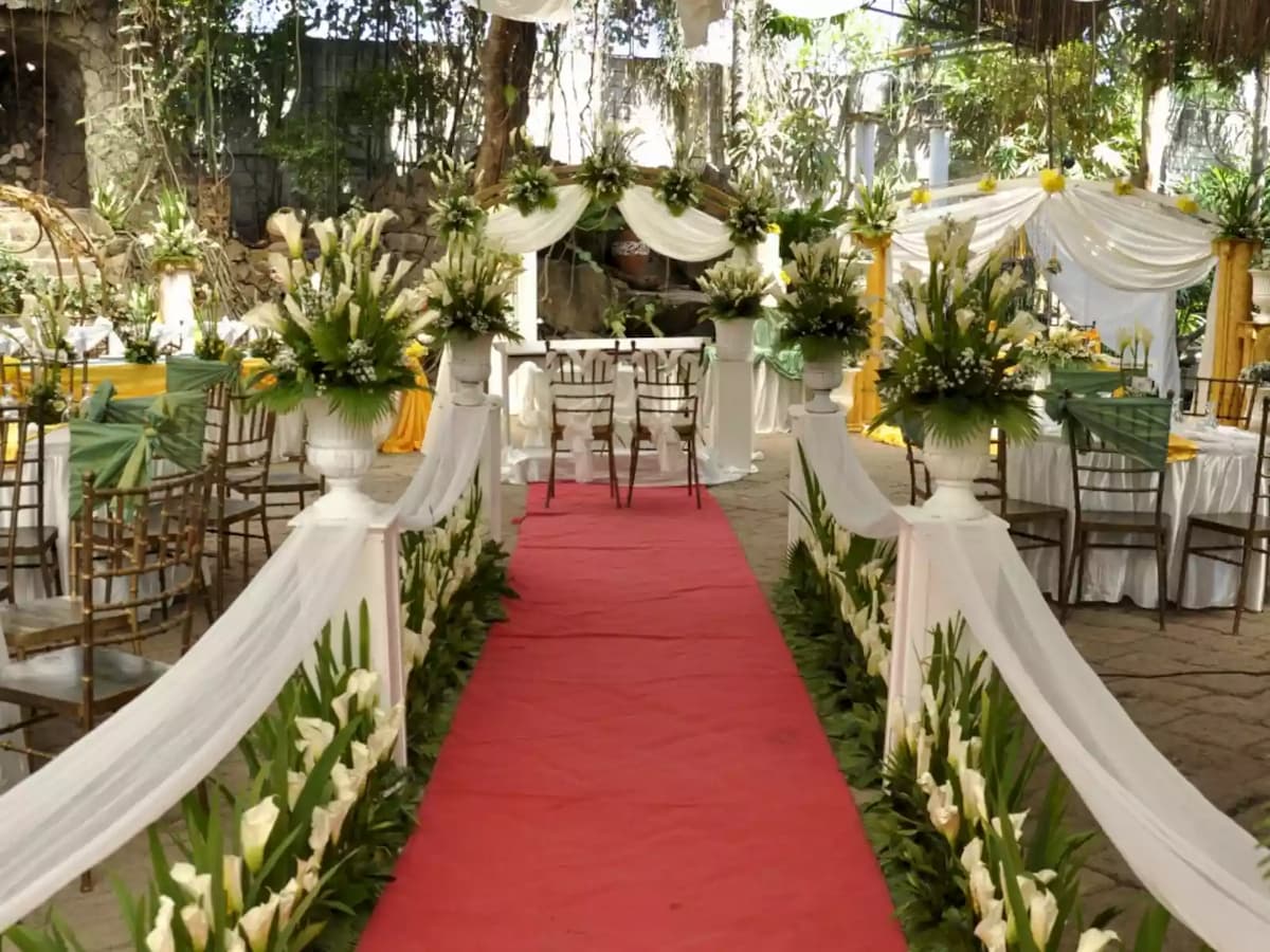 wedding aisle decorated with flowers