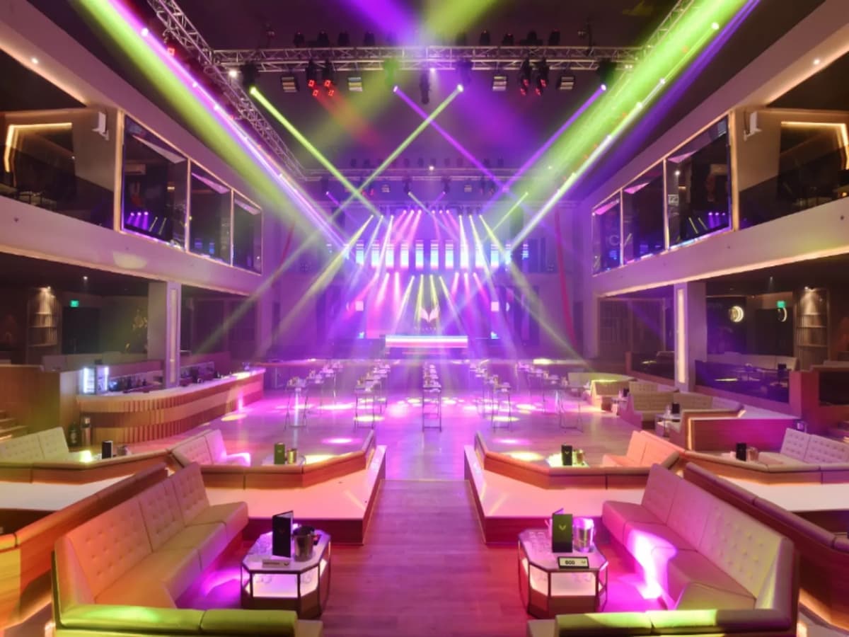 corporate year-end party event venue in taguig with colourful track lights and mini large stage