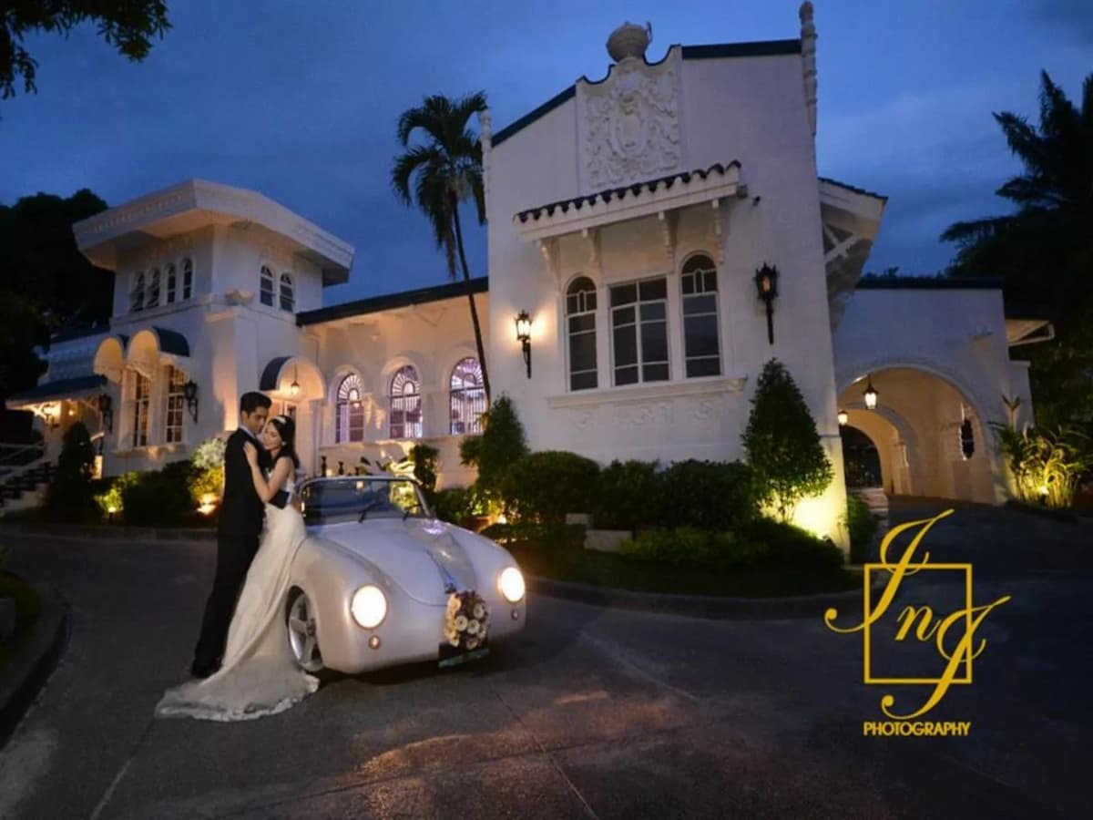 prewedding photoshoot in front of the building together with the vintage quezon citycar
