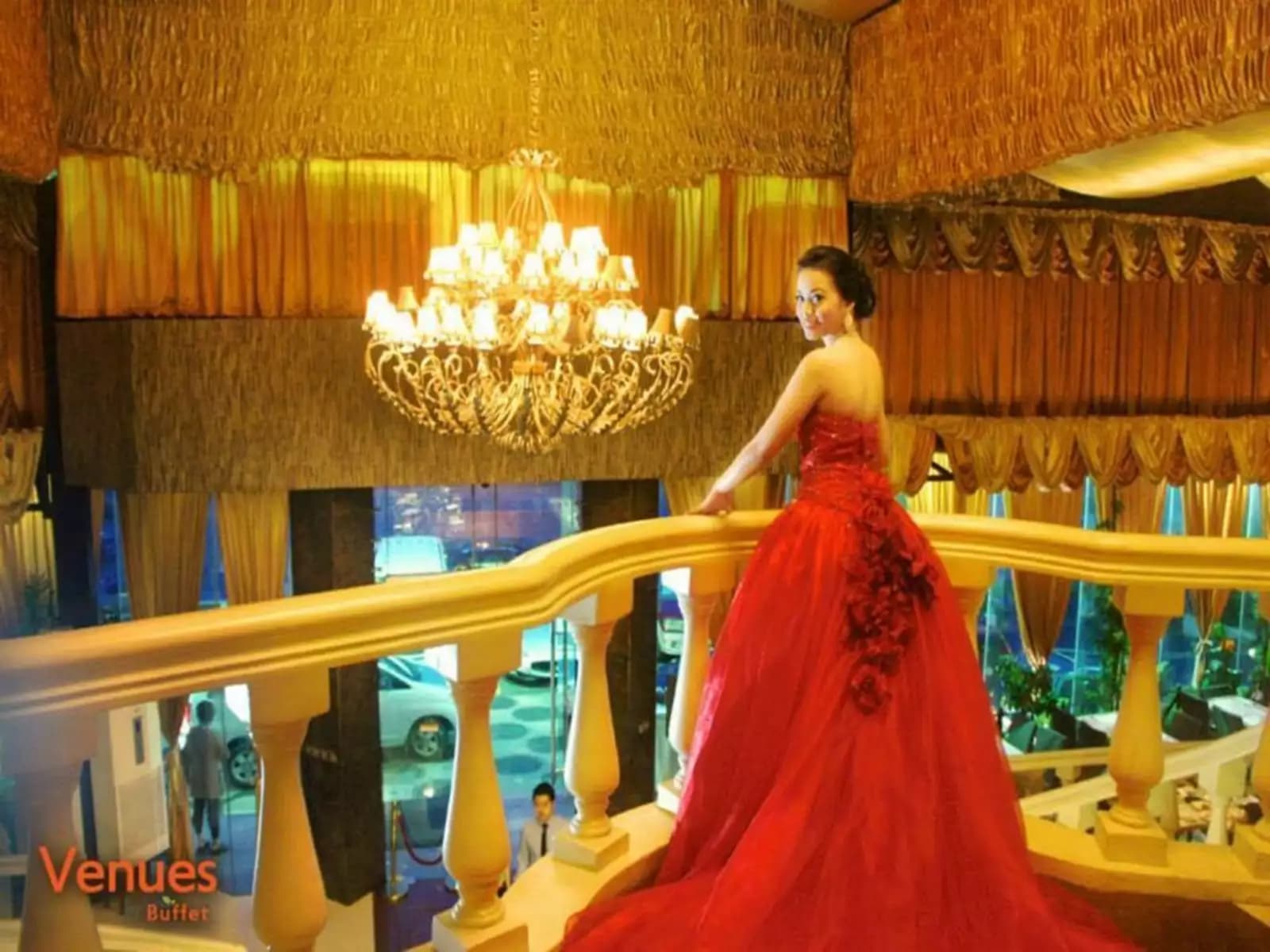 crystal chandelier; bride holding on to railings in hotel quezon city