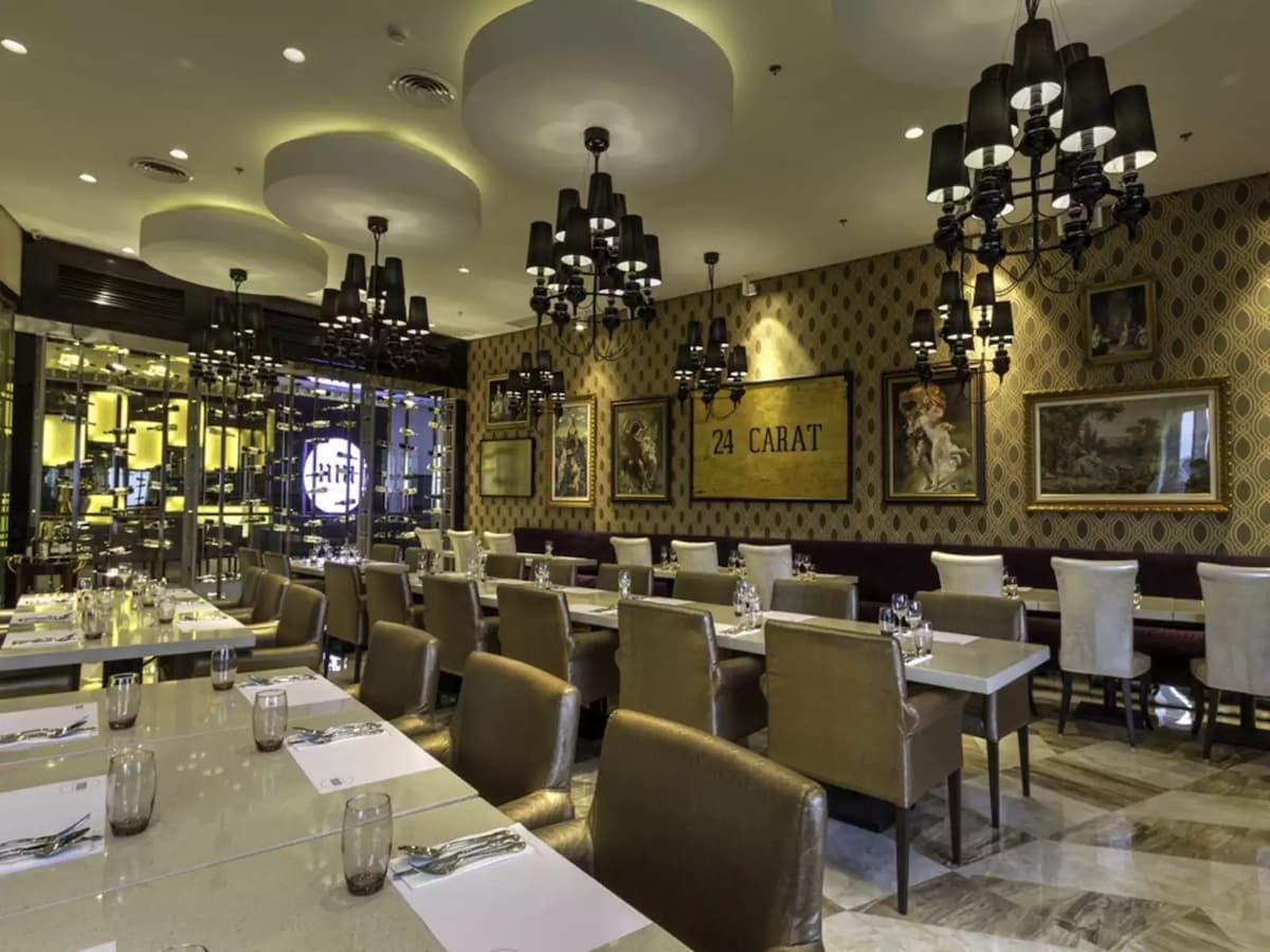 rows of dining tables; chandelier