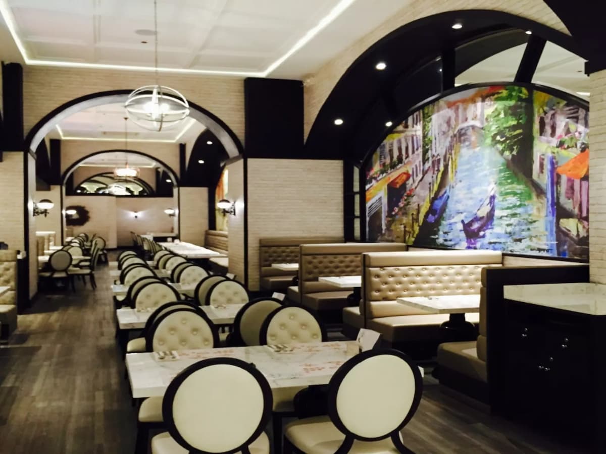 black and white halloween event space in makati with high ceiling and wall painting restaurant makati