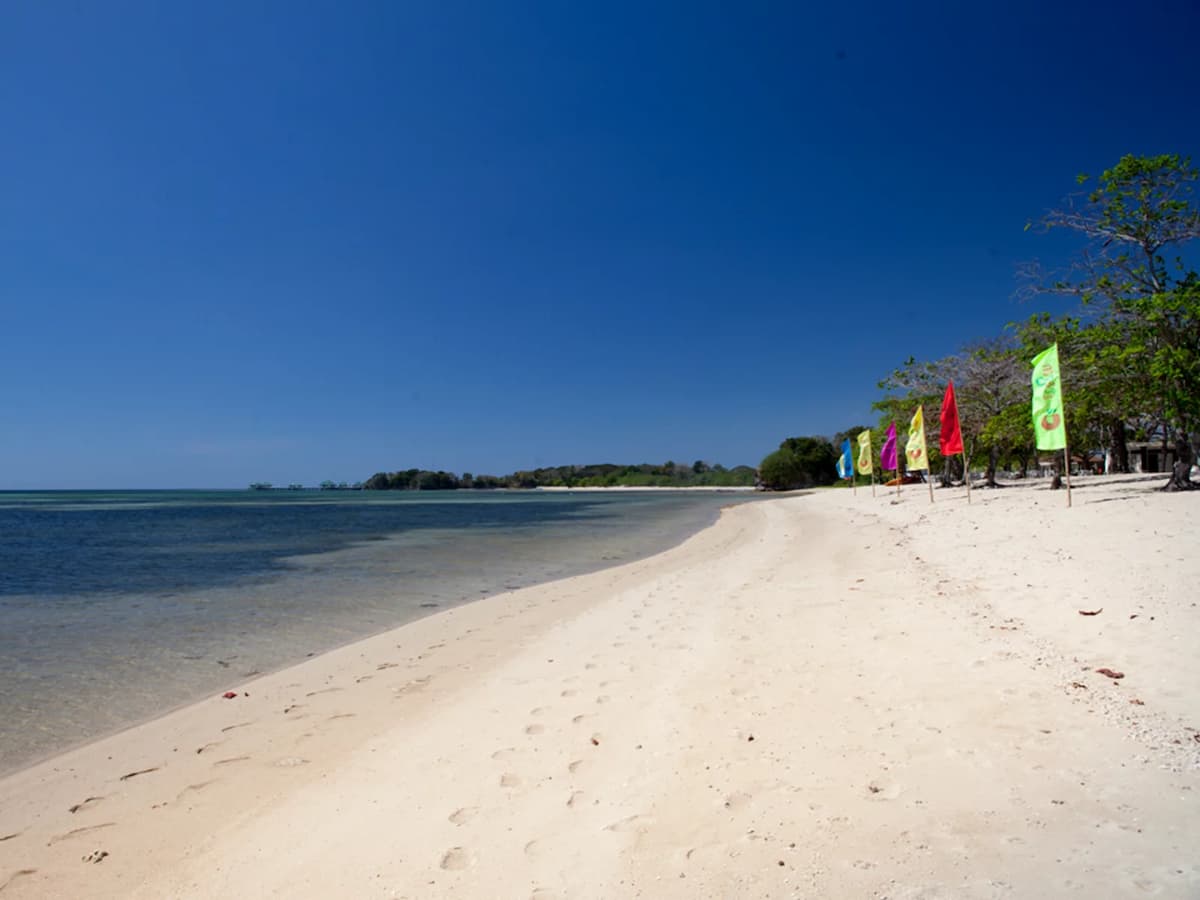 the private beach of aquaria beach resort hotel batangas