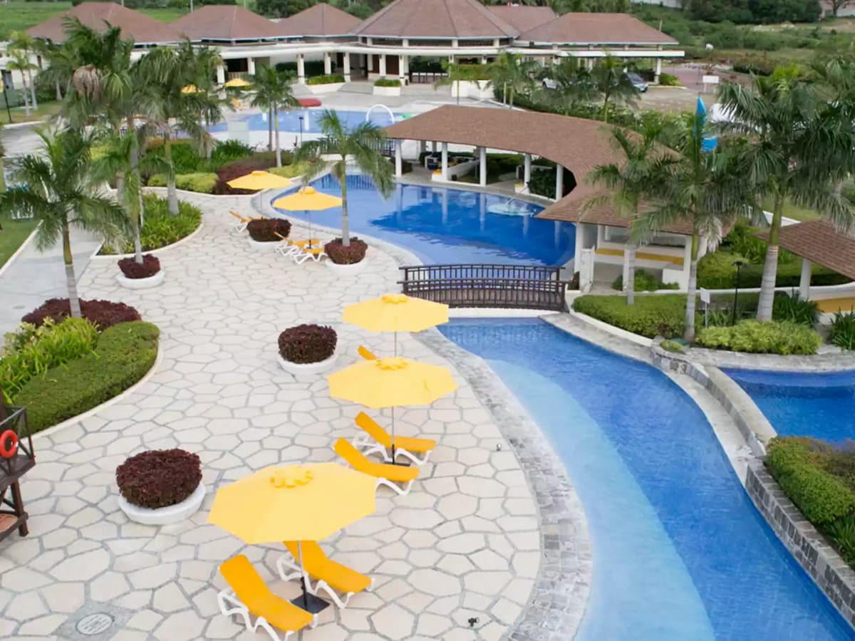 outdoor pool party area surrounded at the resort hotel batangas