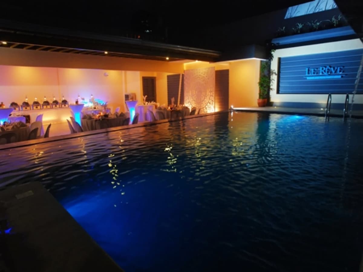 swimming pool next to restaurant
