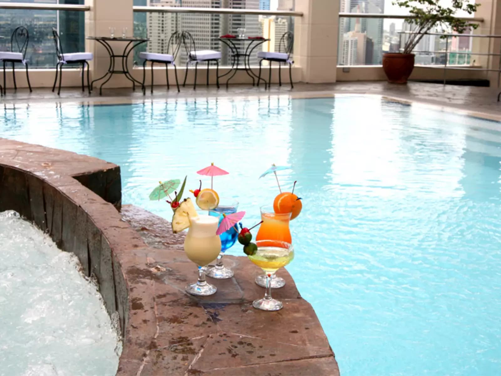 fresh cocktails served at the side of the pool hotel makati
