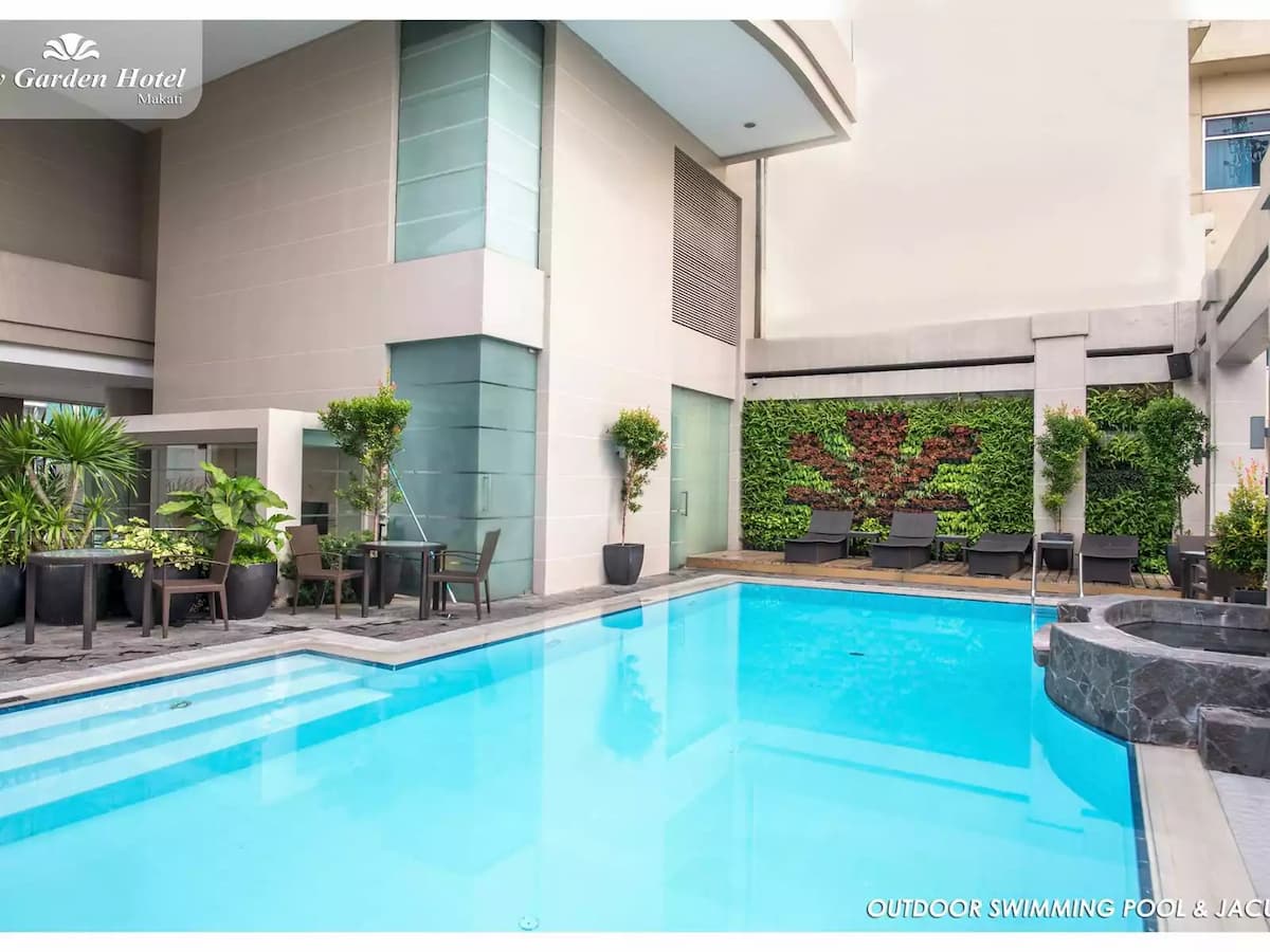 outdoor swimming pool and jacuzzi situated at the top most floor of the hotel makati