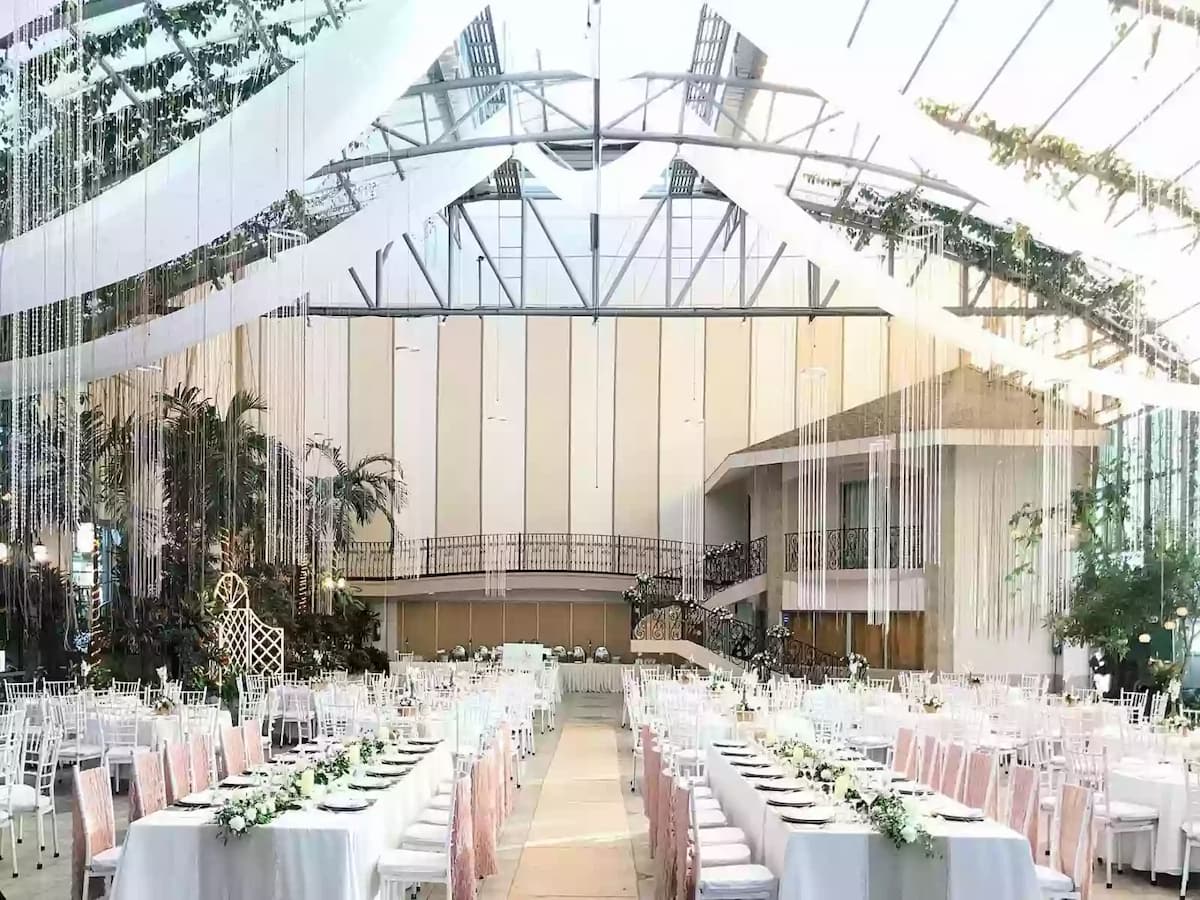 unique glass venue in pasig with imposing high ceilings and lush garden landscapes