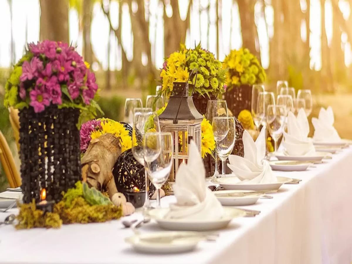 outdoor fine dining table with cutleries and flower centerpieces hotel bohol