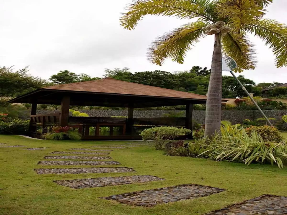large hut in outdoor garden area