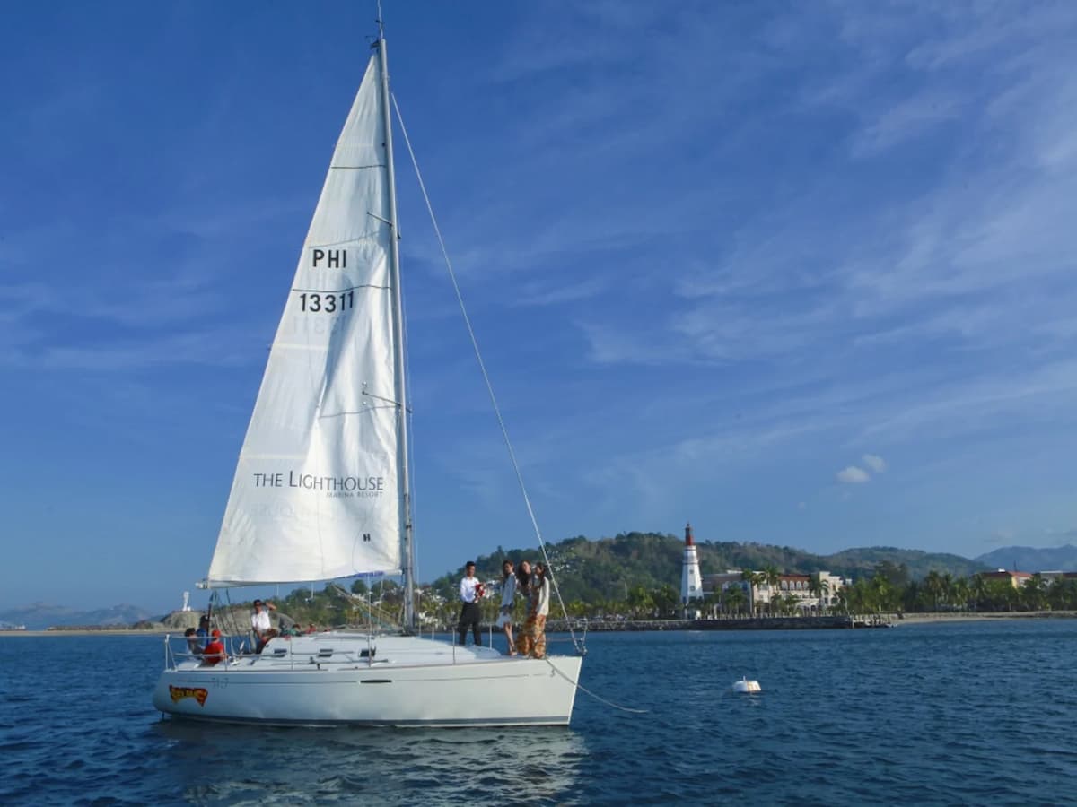medium white yacht sailing in philippines sea