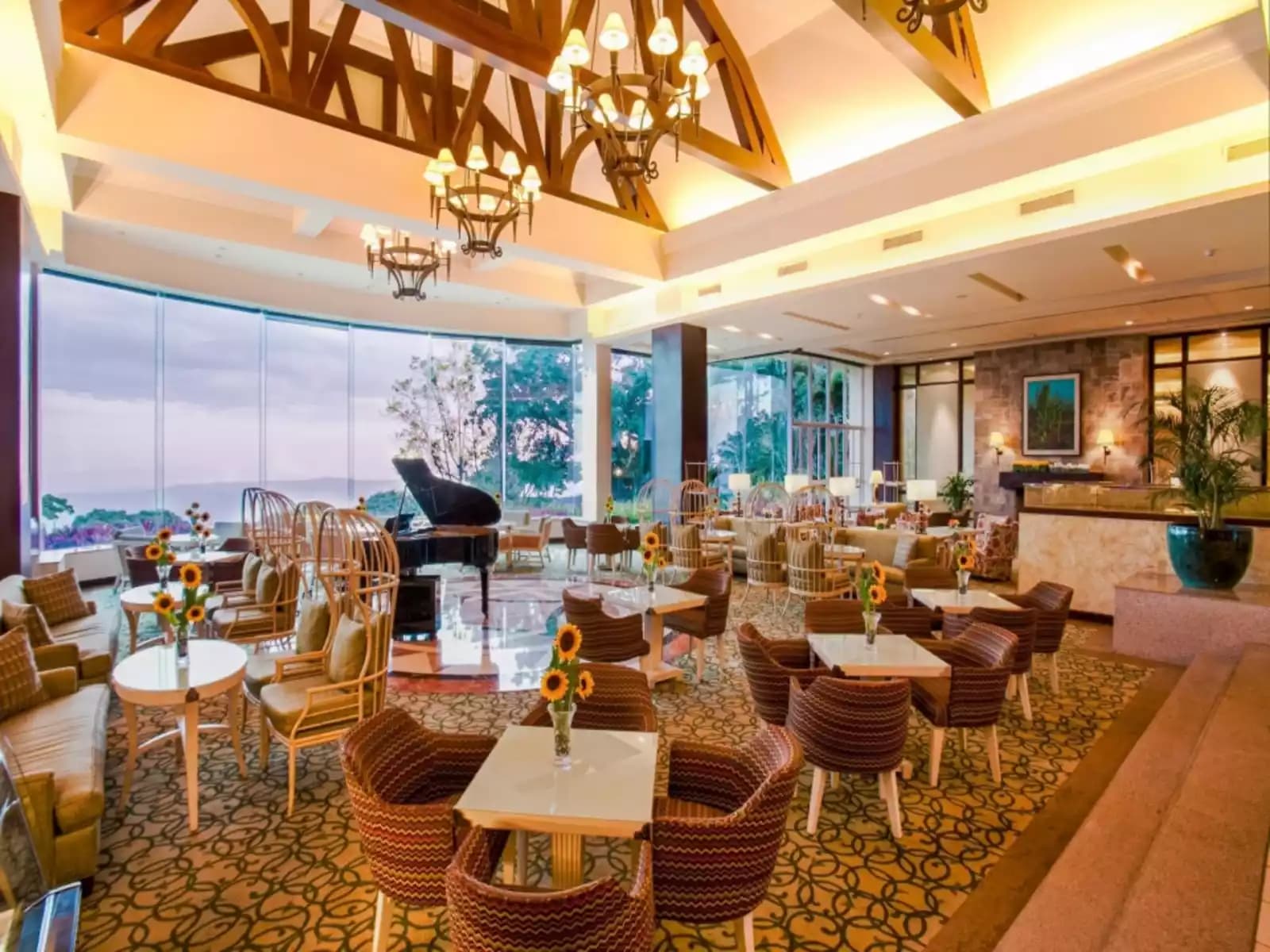 luxury lounge area with ceiling to floor window hotel tagaytay
