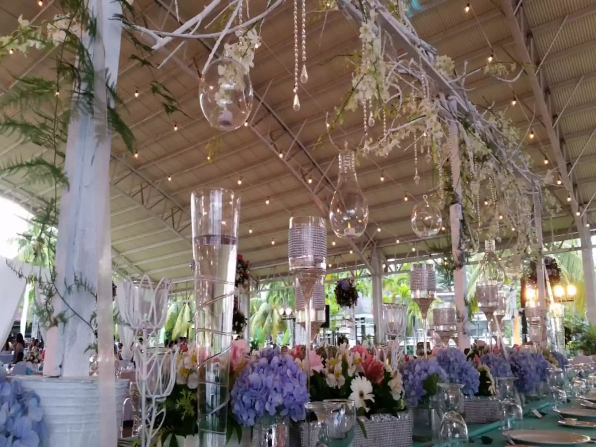 flower decorations with pendant lamp in high ceiling event venue philippines