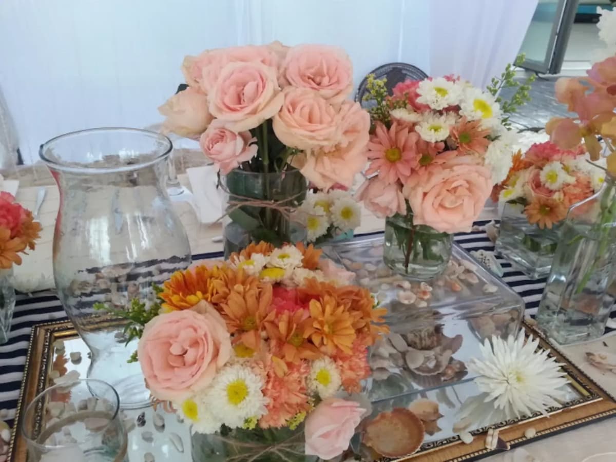 table decoration using pink and orange flowers hotel boracay