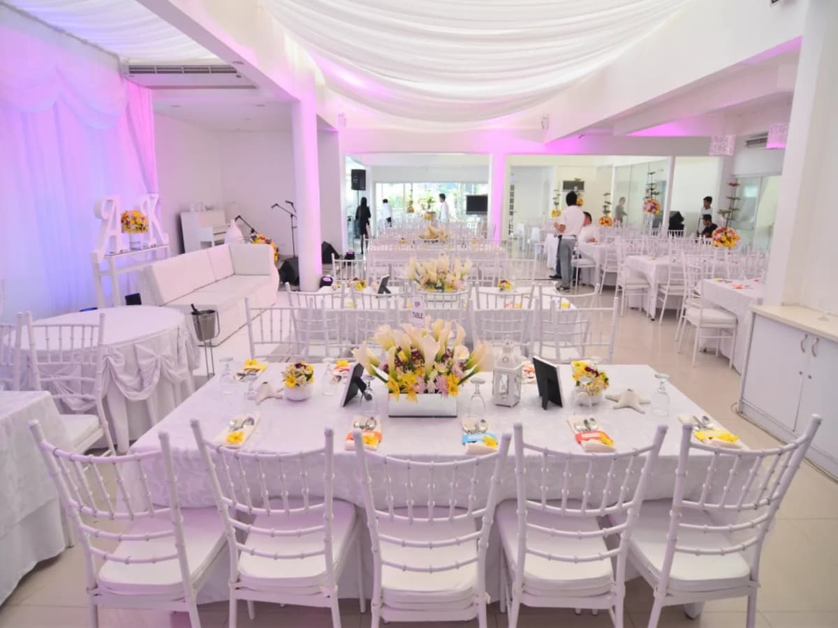 long dining table setup with flower centerpiece resort antipolo