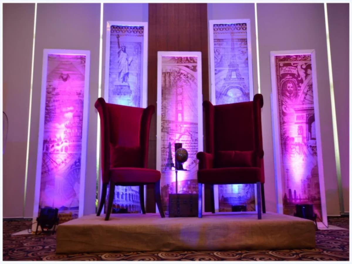 armchairs in room; standing light installations event space pasay