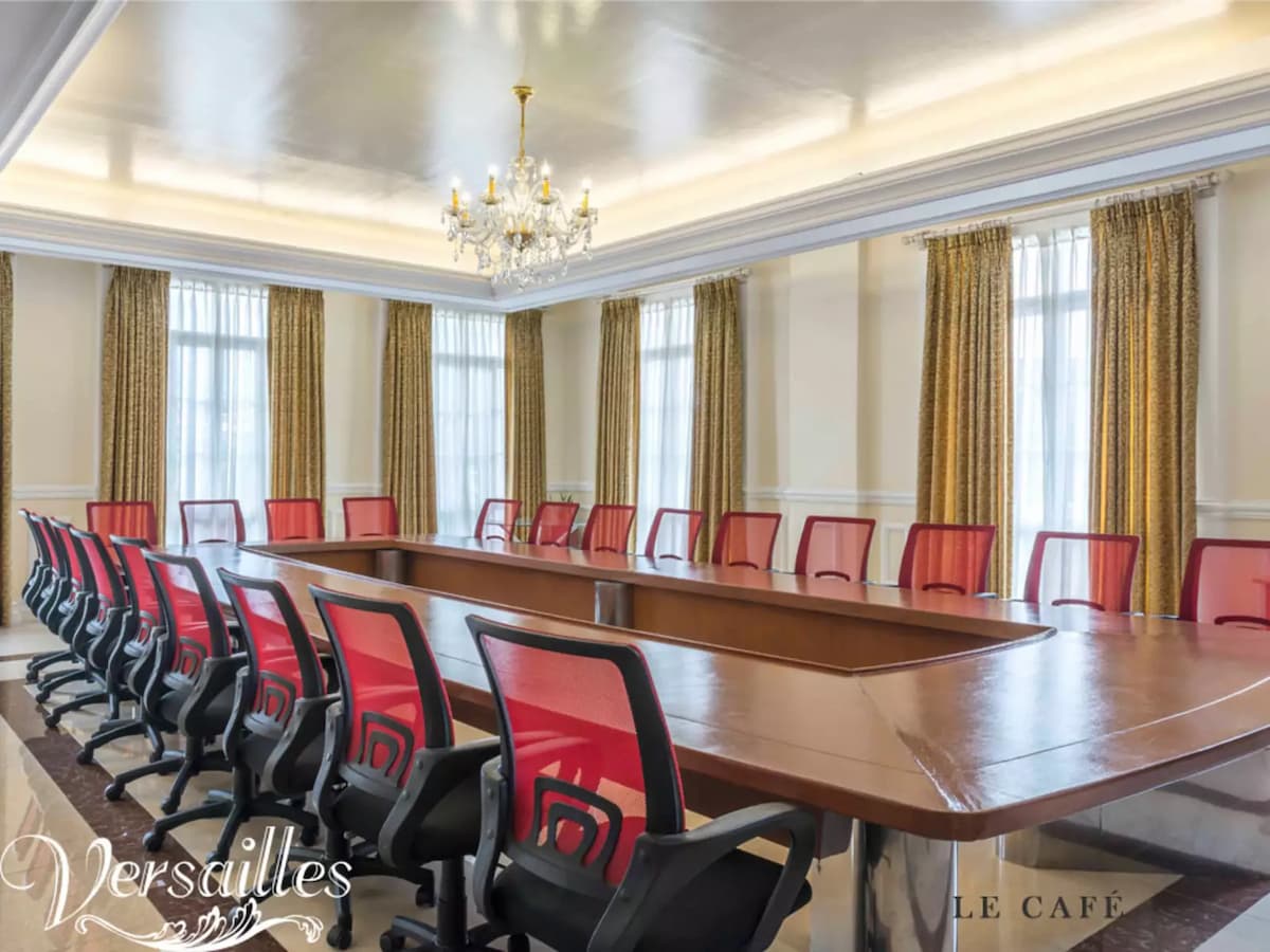 private meeting room in las pinas with brown curtain and long wooden table