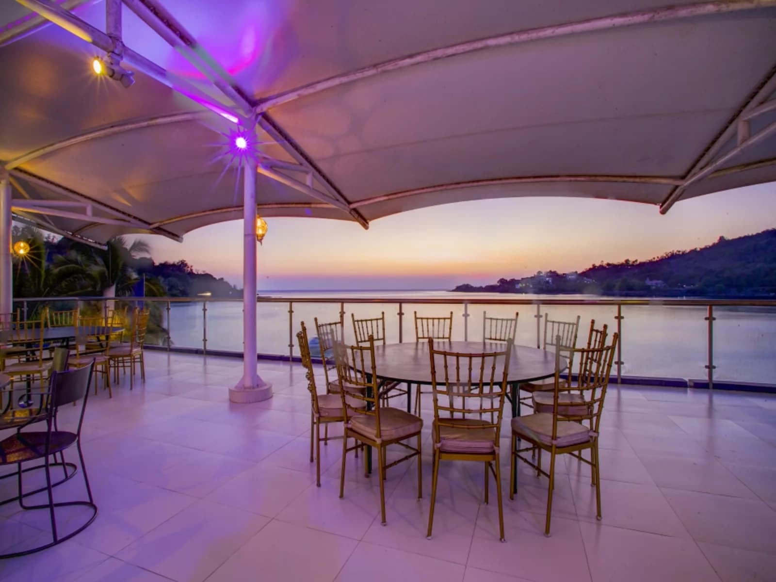 santiago christmas event space with sea view and round dining tables hotel la union