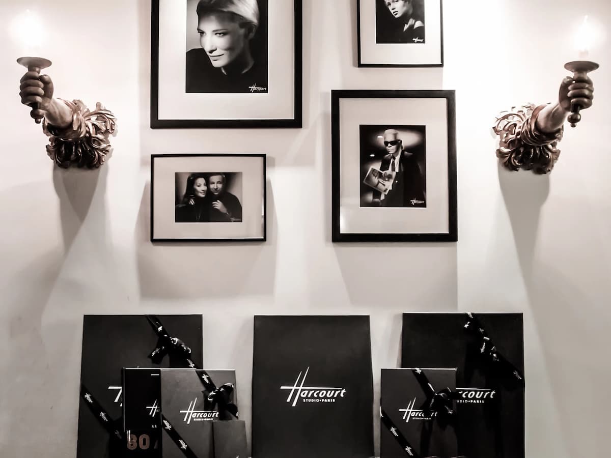 black and white potraits hanging on wall