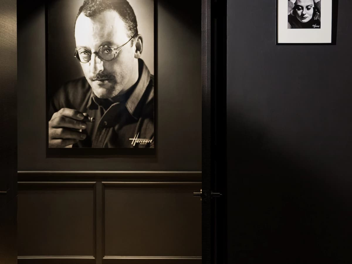 paintings hanged on wall in the hallway of studio harcourt