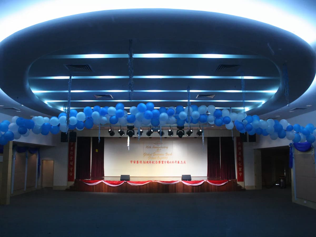 convention centre with stage and high ceiling