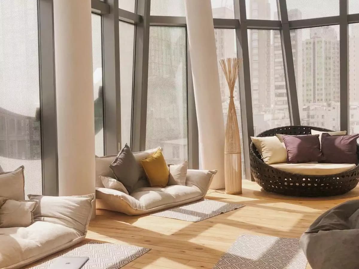 hong kong corporate event space with floor level sofa and large windows
