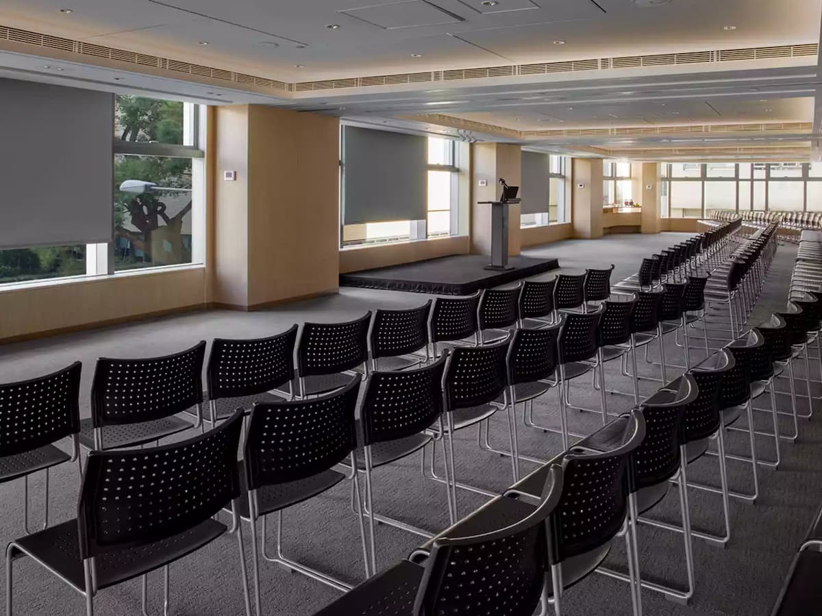 spacious function room prepared for corporate seminar
