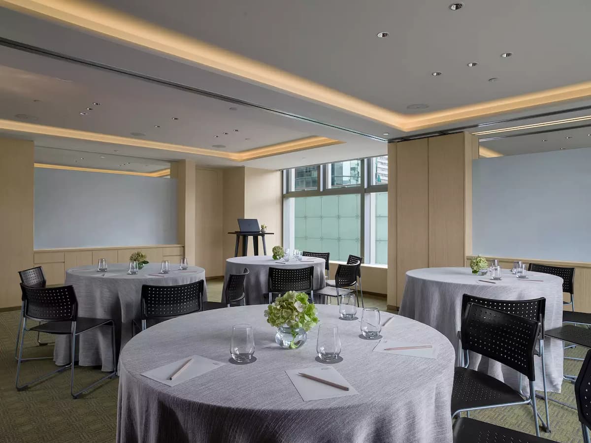 business gathering room equipped with whiteboard for presentation