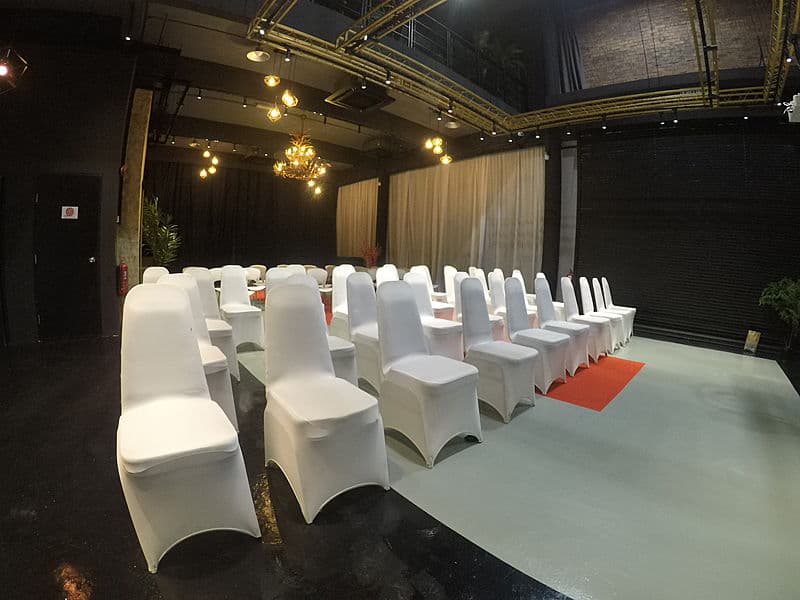 corporate seminar setup with chair using cover