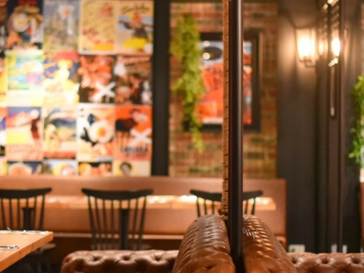 indoor restaurant area with warm lighting and stylish interior
