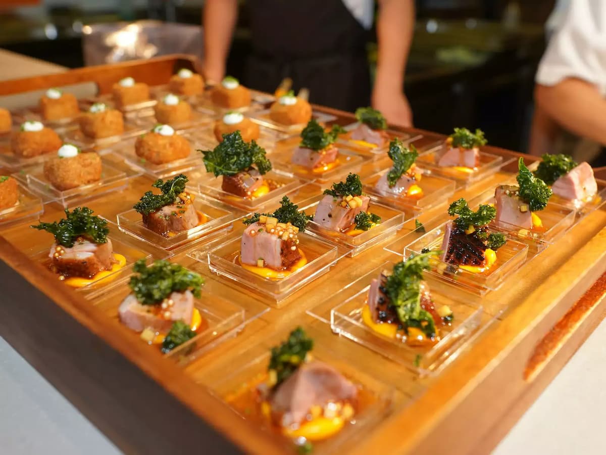 kids birthday dinner event space with desserts served on square wooden plates