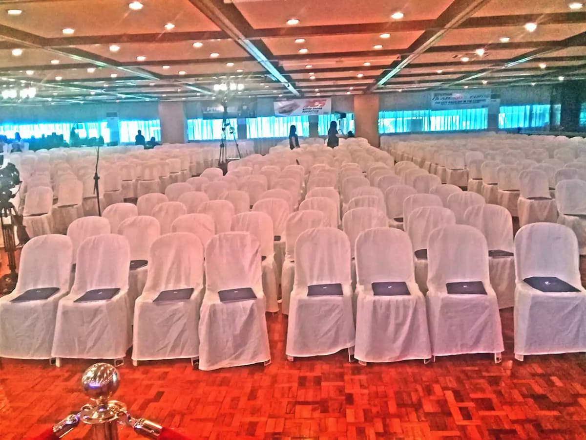 manila large function room with white audience chairs and high ceiling pasig