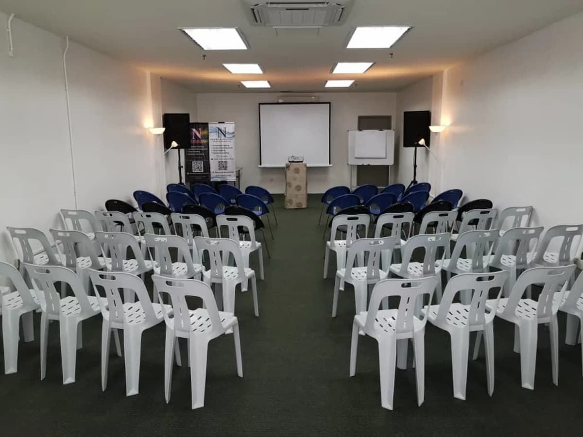 medium size seminar room with projector screen and speakers in penang