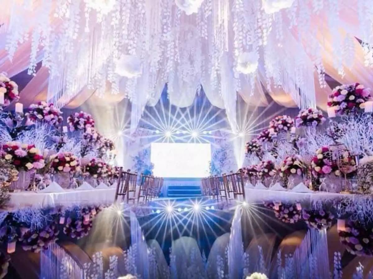 grand wedding reception with flower decoration and big chandelier cebu