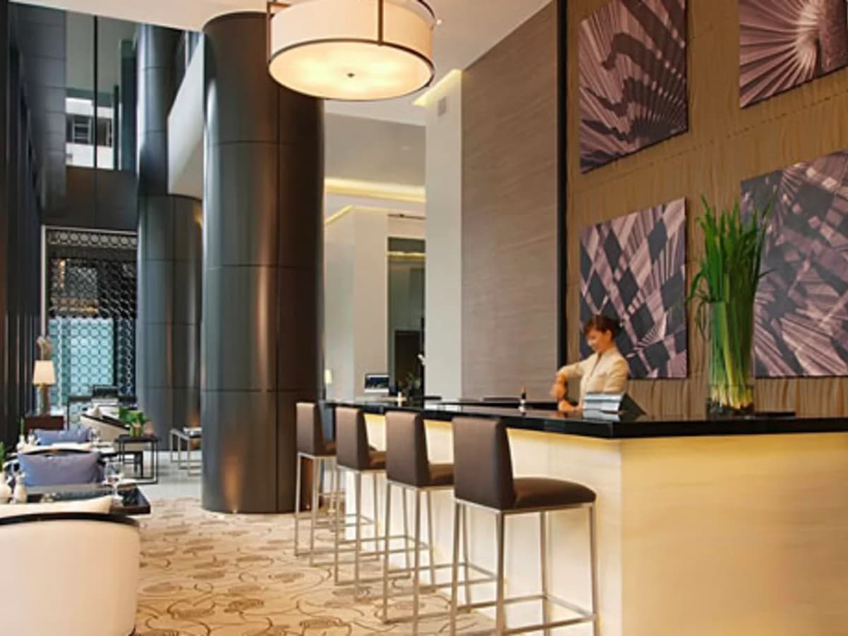 hotel reception area with 1 frontdesk girl hotel taguig