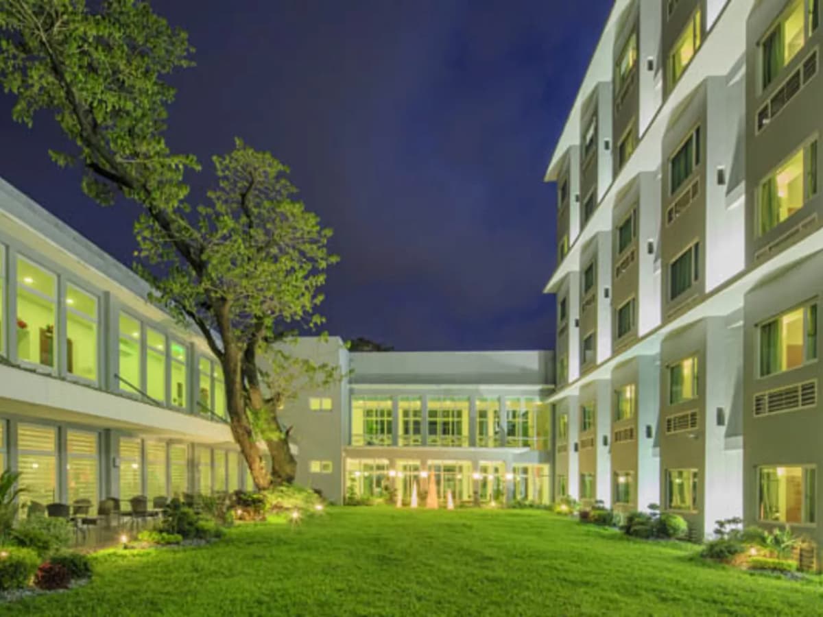 lawn in between hotel buildings quezon city